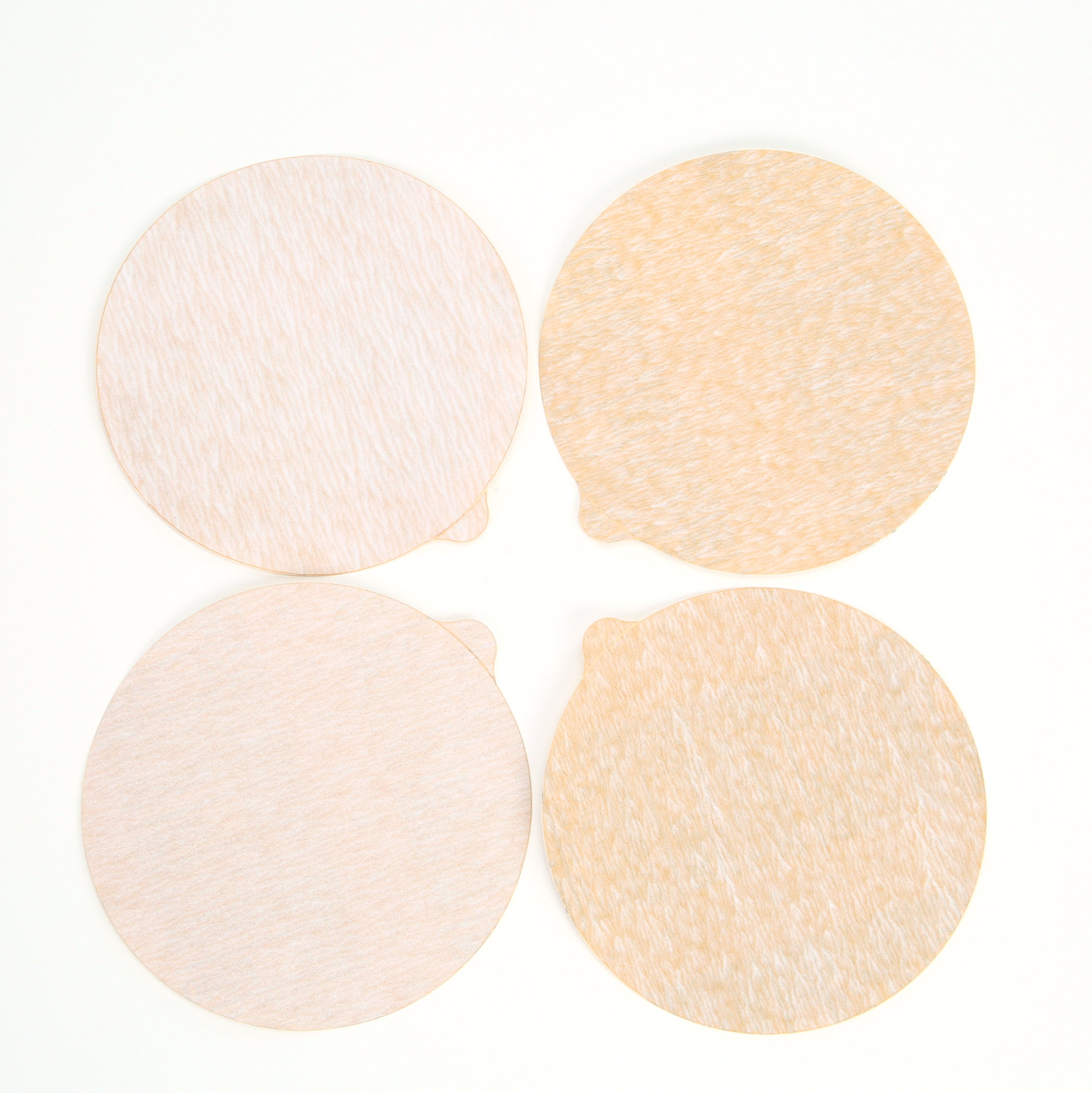 3M™ NX PSA Paper Discs feature an open coat that allows the disc to continue cutting even when sanding softwoods, paints, and other materials that would, otherwise, clog the surface of the disc and hinder sanding ability.
