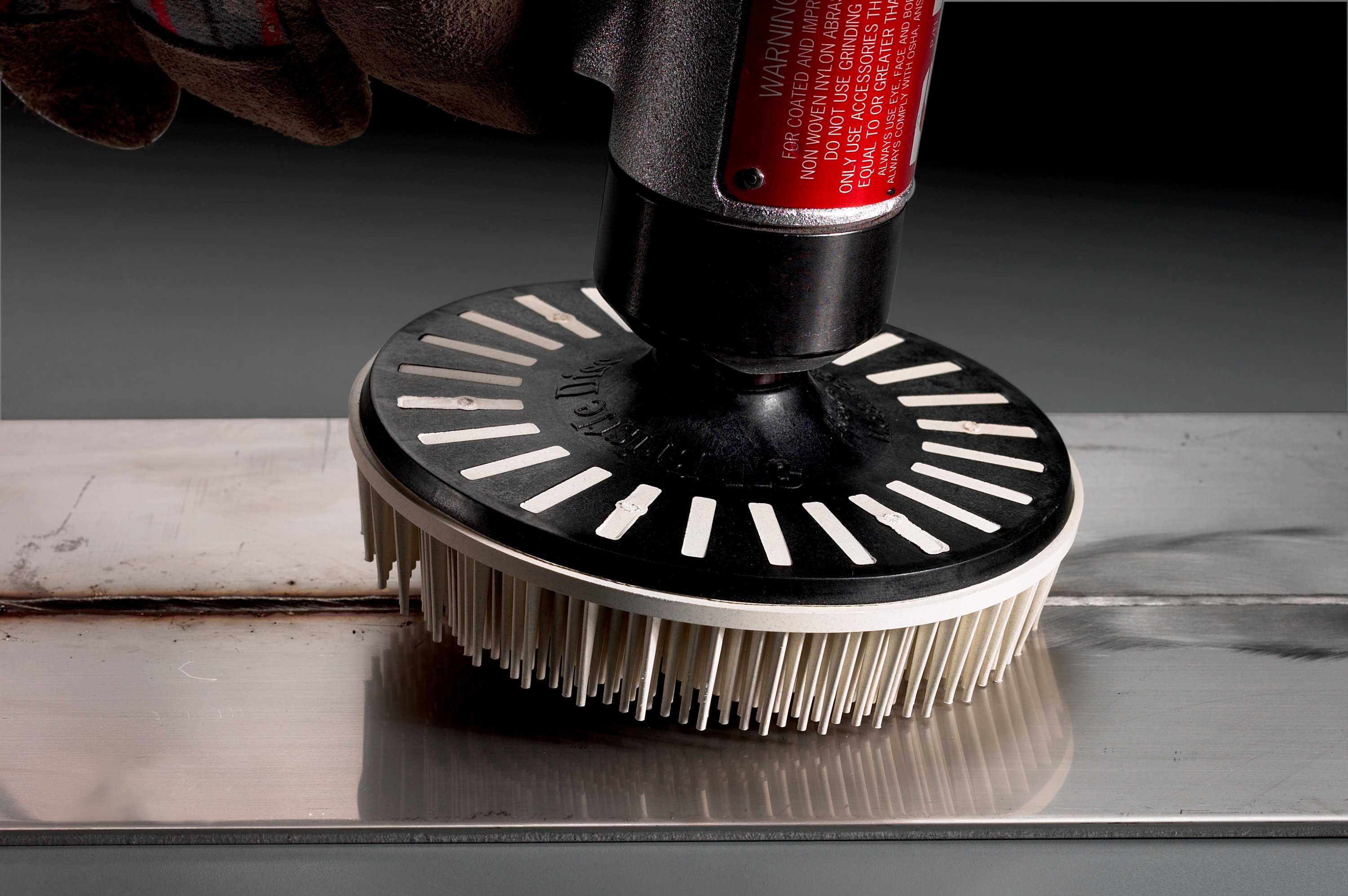 Our Scotch-Brite™ Bristle Disc is designed to last longer than wire and other abrasive discs and works well on aluminum, brass, bronze, carbon steel, cast iron, stainless steel, and other metals.