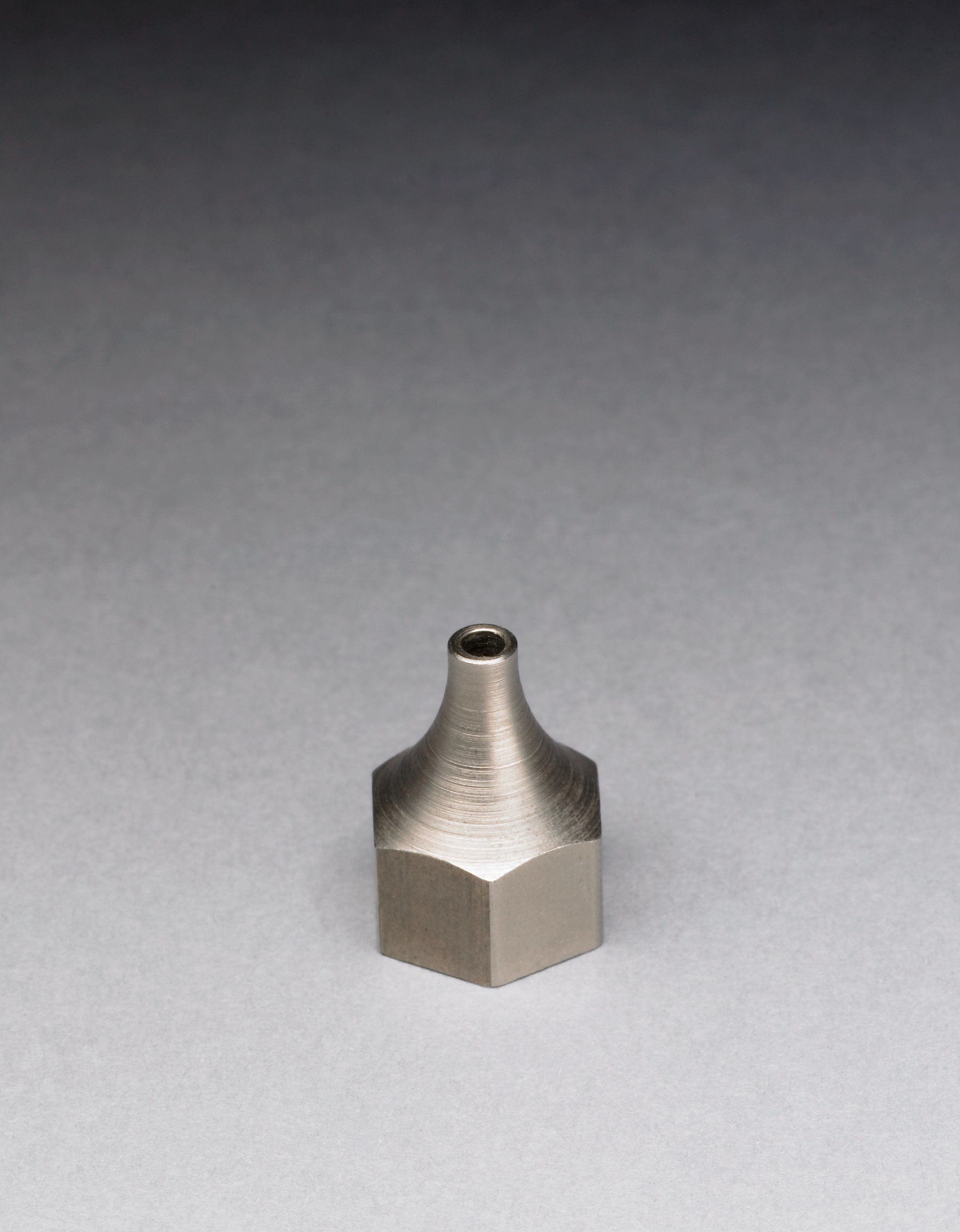 A fluted metal tip designed as a replacement for standard nozzles (0.090") on most 3M™ Hot Melt Applicators.