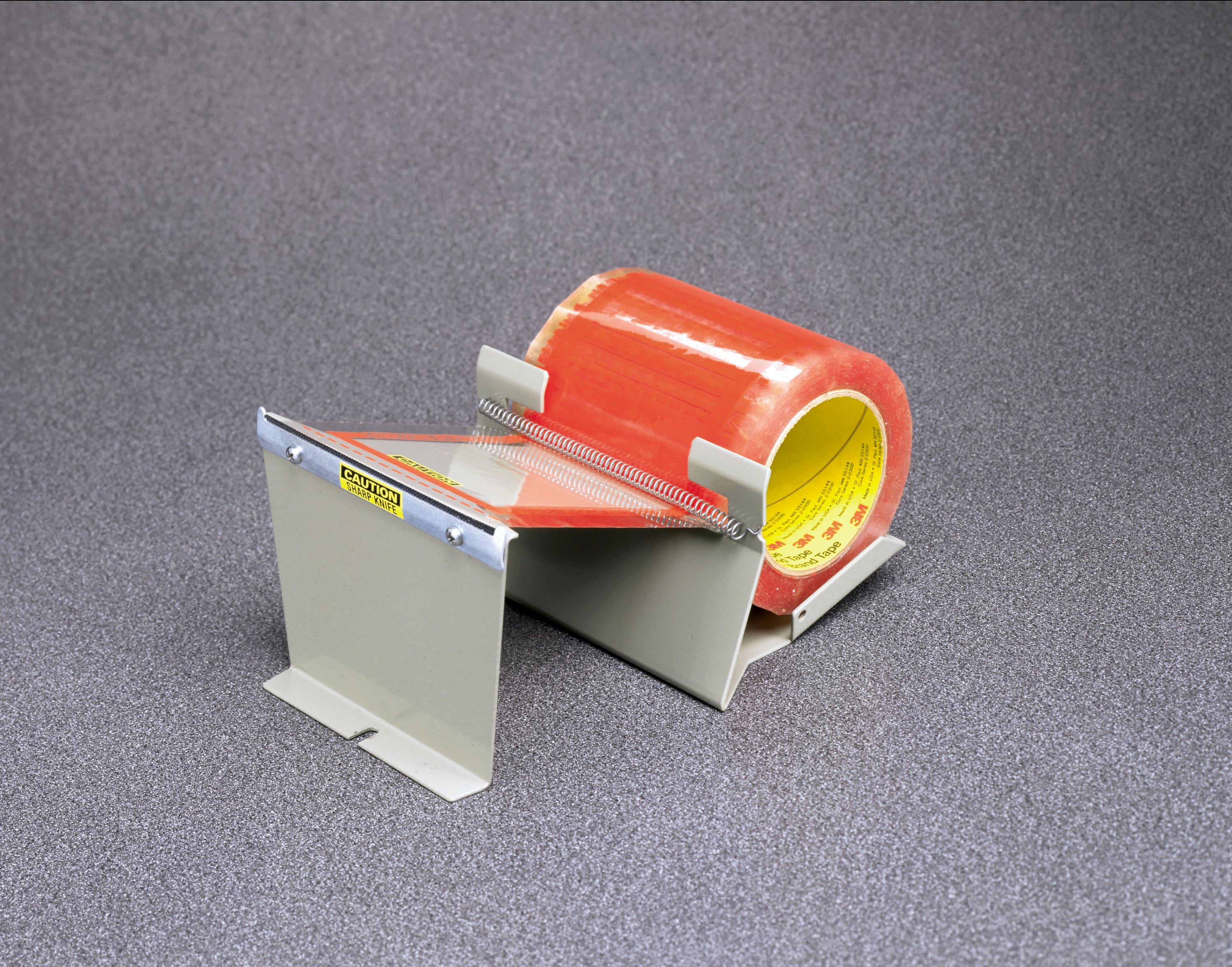 Designed to secure to a table or wall to easily dispense pouch tape