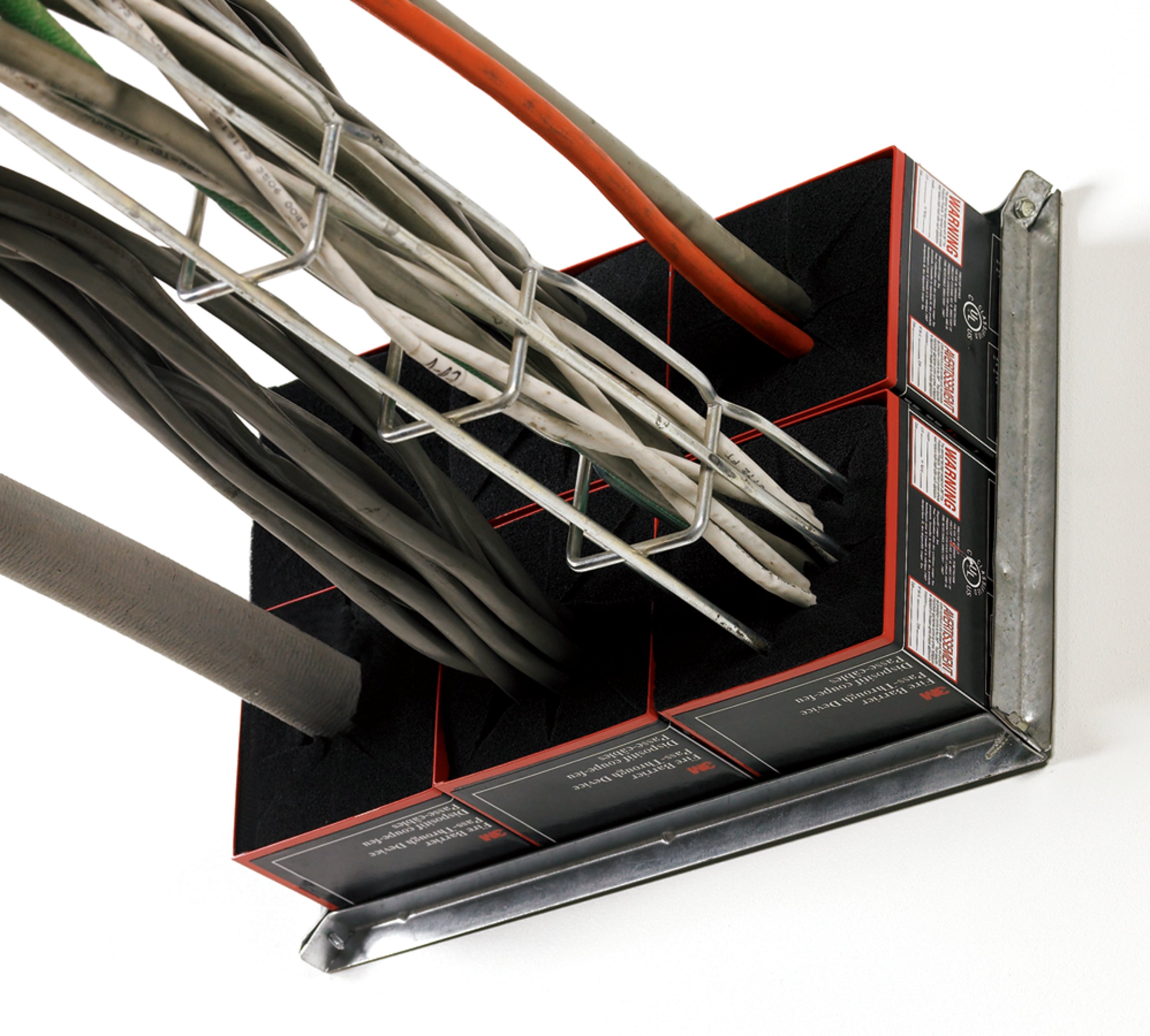 3M™ Fire Barrier Pass-Through Device Square is an ideal firestop solution for through wall penetrations for cabling.