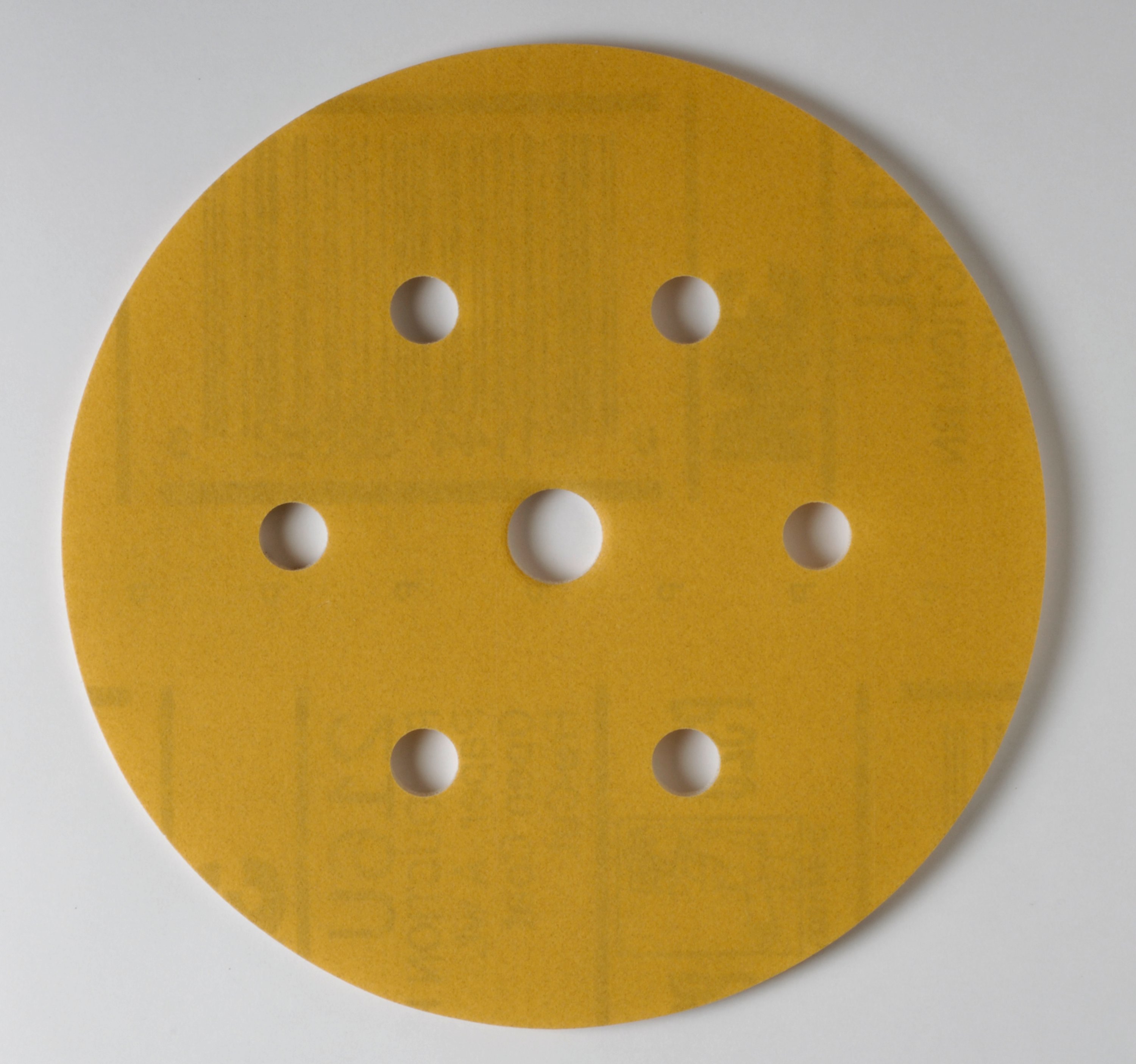 3M™ Stikit™ Gold Film Abrasive Disc Roll 255L is packaged as multiple adhesive-backed discs rolled onto a core.